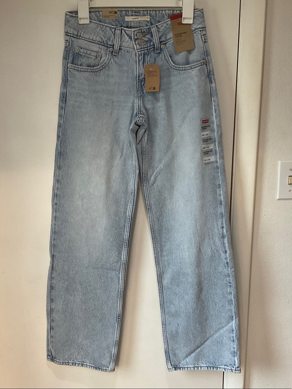 New Levi's Superlow Loose Light Blue Women's Jeans 25x32 Rare Blank Red Tag